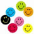 Seven pixelated circular smiley faces in blue, green, orange, black, pink, red, and yellow arranged on a white background with no visible text or additional elements.