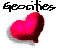 Pixelated heart-shaped icons in varying sizes with pink and dark red coloring, displayed under the text 'Geocities' on a white background.