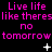Pixelated text repeats 'Live life like there's no tomorrow' in pink on black with animated white symbols appearing and changing.