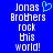 Blue background with white pixelated text reading "Jonas Brothers rock this world!" and a cyan heart symbol above "Jonas" on the left side.