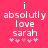 Pixelated text on a pink background reads 'i absolutely love sarah' with five small pink hearts below, showing slight animation in heart positions.