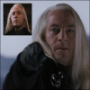 A person with long light hair wears a dark coat with a fur collar and a silver brooch, with four small inset images showing different angles of the same person.