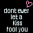 Pixelated text reads 'dont ever let a Kiss fool you' with a pink heart symbol above, displayed in two identical side-by-side on a black background