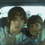 Two people in a car with text overlays reading "I love you more than but I don't want to!!!" in pink and blue lettering.