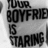 Black-and-white buddy icon with text "YOUR BOYFRIEND IS STARING" and "Fight" with a heart symbol, showing hands clasped in a blurred background.
