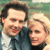 Static 50x50 pixel icon showing two people in close proximity with blurred background, rendered at low resolution with visible dithering and color banding.