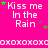 A bright pink background displays repeated text 'Kiss me In the Rain' with green and purple stars scattered throughout.