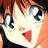 A pixelated anime-style character face with large green eyes and red lips on the left, next to a black background with white text "Anime IM" and stylized "C0M" on the right.