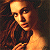 A 50x50 pixel buddy icon split into two sections: a pixelated portrait of a woman with long brown hair on the left and green text reading "Original Icons .com" on a dark green background on the right.