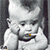 A black-and-white animated sequence shows a baby in four distinct poses across four , each displaying a different hand position and facial expression