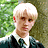 Pixelated image of a person with platinum blonde hair in various poses against green foliage, including close-up and full-body views.