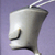 A pixelated grey cone-shaped object with a curved black line on its side, set against a solid purple background.