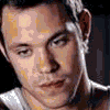 Six- of stylized portraits with purple text overlays reading "Pop Music?" and "And Reality TV? Looks Good..." on a light gray background