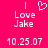 A bright pink background displays white pixelated text and symbols, including 'I Love Jake' with a heart symbol above the word 'Love', and the date '10.25.07' at the bottom.
