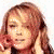 A 50x50 pixel animated contact sheet showing three frames of a woman with light brown hair wearing a purple crop top and blue jeans, captured in different poses against a white background.