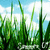 Pixelated green foliage with vertical stems against a light blue sky background, showing no visible text or distinct objects.