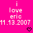 Bright pink background with repeated white text "i love eric 11.13.2007" and black pixel hearts, partially cropped on the right side.