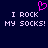 Dark blue background with pixelated white text reading "I ROCK MY SOCKS!" repeated twice, a pink pixelated heart symbol above the left text block.