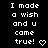 Pixelated text displays 'I made a wish and u came true!' with heart or arrow symbols on black background, arranged in -like layout