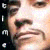 A four- of pixelated images with text overlays: top-left shows a person's face, top-right has 'gwards' text, bottom-left displays 'nominee' over a figure, and the bottom-right is blank
