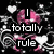 Pixelated pink skull with white hearts and crossbones on black background, displaying text "I totally rule" and "n'Kay? okay." in white and black lettering.