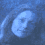 A pixelated blue-toned image of a person's face with text appearing sequentially across six , starting with a single 'L' and building to 'LILY' in dark blue letters