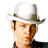 A pixelated image shows a person wearing a white cowboy hat and dark clothing, with 'Be Cool' text in black and beige on the right side.