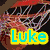 A four- of pixelated images with text overlays: top-left shows a basketball hoop, top-right features colorful cartoon characters, bottom-left displays red circular symbols and partial text, bottom-right contains blue and yellow shapes