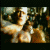 A pixelated animated sequence shows a figure in motion against dark background with blurred surroundings.