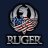 Circular icon with a metallic silver border containing abstract multicolored pixel patterns and the text "RUCFR" below on dark background.