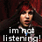 Pixelated image of a person with red hair and dark clothing, mouth open in mid-speech, overlaid with white text reading "im not listening!" on a dark background.