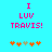 Pixelated text 'I LUV TRAVIS!' in pink on cyan background with orange and beige star-like shapes below.