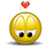 Yellow spherical character with segmented top, black eyes, and white mouth showing teeth; red/purple hearts float above in various configurations.