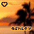 Pixelated sunset scene with palm trees and a heart icon, showing two states of the name 'ashley' in yellow text.