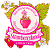 Pixelated static icon featuring a pink strawberry-shaped object inside a white circular frame with green leafy accents and red berry-like shapes at the bottom, surrounded by yellow-green foliage on both sides.