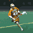 Animated sequence of a lacrosse player in orange uniform running with stick toward goal net on green field.