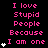 Pixelated pink text on black background repeats 'I love Stupid People Because I am one' with white heart symbols in a