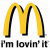 Yellow and black McDonald's arches logo with 'i'm lovin' it' text below on white background