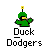 Four identical pixel art frames of a green duck mascot with yellow beak and feet, wearing a black mask-like shape on its face, holding a small object in one wing, with "Duck Dodgers" text below it.