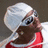 Pixelated image of a person with a white headwrap and red clothing on the left, next to blue background with black text reading "I love Soulja Boy" on the right.