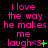 A static image displays repeated text in pink with green symbols on a black background, showing variations of 'I love the way he makes me laugh' followed by emoticons.