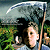 Pixelated static image of a person holding a scythe in an outdoor setting with greenery and sky background.