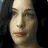 A 48x48 pixel buddy icon featuring a split composition with a grayscale portrait on the left and "The Lord of the Rings: The Return of the King" title text on the right, rendered in golden-brown tones against a dark background.