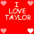 Red background with pixelated text "I LOVE TAYLOR" and heart symbols in pink and white.