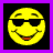 Yellow pixelated smiley face wearing black sunglasses with red lips, next to text reading 'MY SMILEY IS KOOLER THAN URS' on white background.