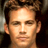 Static 48x48 pixel icon showing a close-up of a person's face with brown hair and neutral expression, rendered in low-resolution pixel art style on dark background.