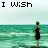 Pixelated beach scene with a figure standing in water, text reading "I wish you came by more often." in top-left corner.