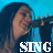 six identical frames showing a person with long dark hair holding an object near their face against a blue background, each frame displaying the word "SING" in white text