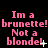 Pixelated pink text on black background repeats "Im a brunette! brunette! brunette! Not a blonde!" with small white plus and asterisk symbols.