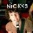 Pixelated image of a person with light skin and brown hair holding a microphone, text "NICK53" above in white block letters.